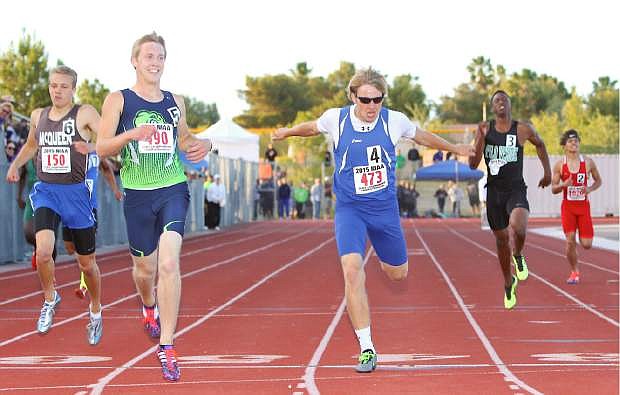 Carson High&#039;s Corey Reid narrowly gets beat to the tape by Green Valley&#039;s Ian Mack in the Boy&#039;s 400-meter event. Mack set a stadium record.
