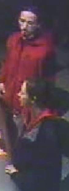Two suspects are sought in a purse snatching.