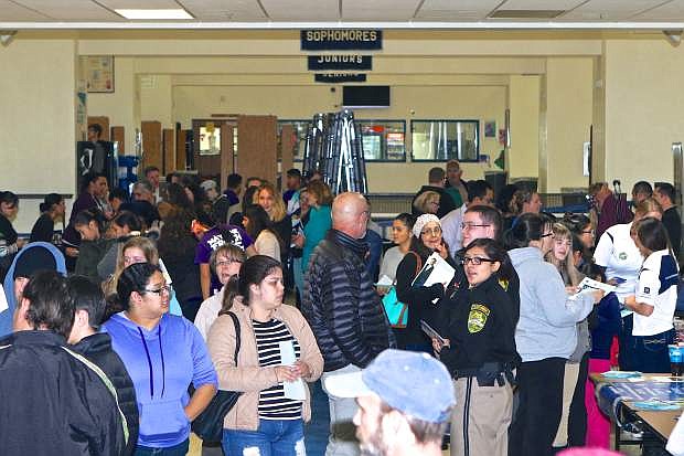 Incoming freshmen, CHS students, parents and vendors pack Senator Square Thursday during the Big Blue Welcome and Career Expo.