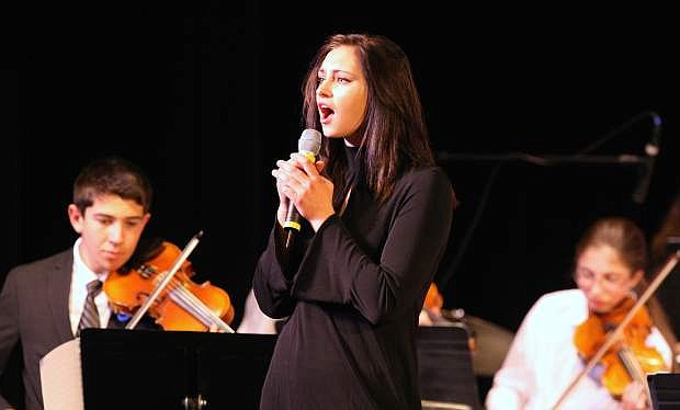 Athena Favero sings &quot;Let It Go&quot; at the Strings in the Schools annual &quot;This is not a Christmas Concert&quot; on Tuesday night at the community center.