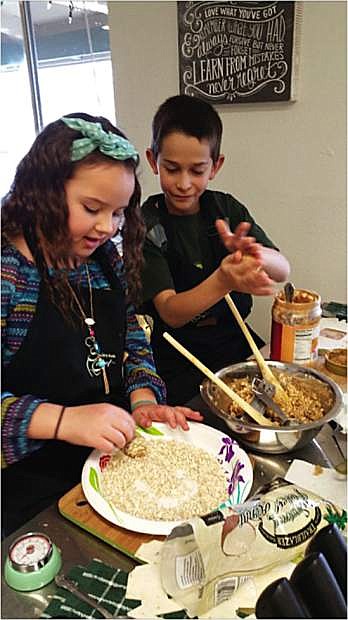 Gabby and Anton make no-bake power ball cookies at Sierra Chef Culinary Center in Gardnerville.