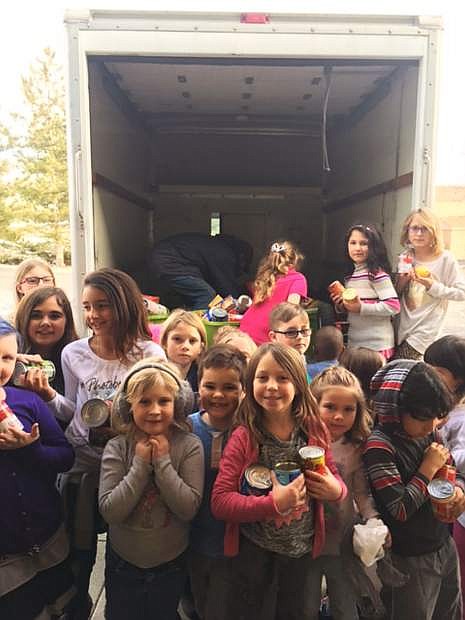 Carson Montessori School students collect food for FISH.