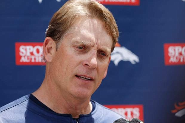 FILE - In this May 29, 2014, file photo, Denver Broncos defensive coordinator Jack Del Rio talks to reporters after players took part in the team&#039;s NFL football minicamp at the Broncos&#039; headquarters in Englewood, Colo. Del Rio will be the first candidate to have a second interview with the Oakland Raiders for their head coaching job as the two-week search could be nearing a conclusion. A person with knowledge of the plans said Monday, Jan. 12, 2015, that Del Rio will interview with Oakland on Tuesday. The person spoke on condition of anonymity because the team is not releasing details on interviews. (AP Photo/David Zalubowski, File)