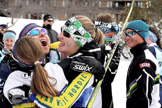 Far West Nordic girls celebrate together during the U.S. Cross Country Ski Junior Nationals in Stowe, Vt.