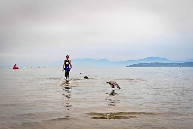An Ironman competitor took to Lake Tahoe&#039;s waters Sunday morning. Despite the race&#039;s cancelation, many tri-athletes took a swim in the lake Sunday morning, and many cyclists were on the road as well.