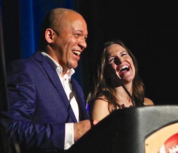 Emcee&#039;s Ron James and Meghan Burk share a laugh during the Mr. Carson High competition Saturday night.