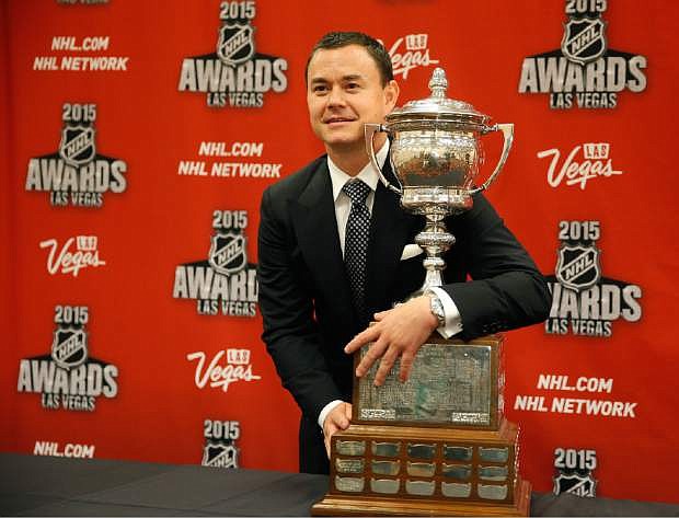FILE - In this June 24, 2015, file photo, Jiri Hudler of the Calgary Flames poses with the Lady Byng Memorial Trophy after winning the award at the NHL Awards show in Las Vegas. A person with direct knowledge of the NHL&#039;s decision says the league has settled on Las Vegas as its choice for expansion, provided organizers can come up with a $500 million fee. The person spoke Tuesday, June 14, 2016, on condition of anonymity because details have not been released by the league ahead of its Board of Governors meeting on June 22. (AP Photo/John Locher, File)
