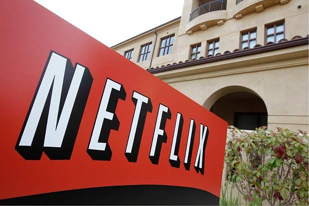 FILE - This March 20, 2012 file photo shows Netfilx headquarters in Los Gatos, Calif. Netflix on Thursday, Oct. 8, 2015 announced it is raising the price of its Internet video service by $1 in the U.S. and several other countries to help cover its escalating costs for shows such as &quot;House of Cards&quot; and other original programming. (AP Photo/Paul Sakuma, File)