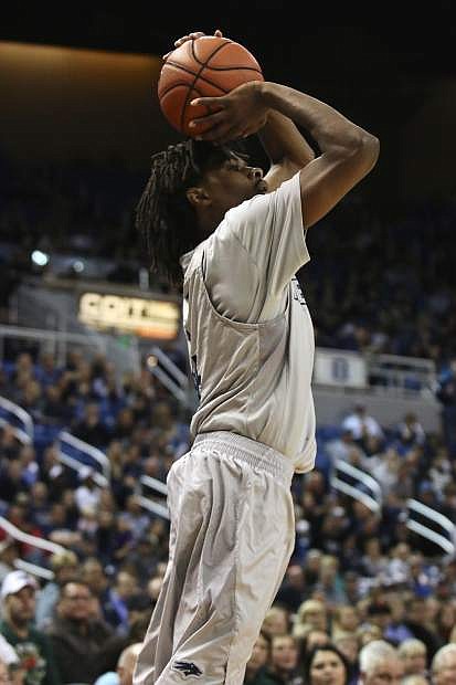 Nevada&#039;s Lindsey Drew pulls up for a jump shot during a game San Diego State earlier this season.