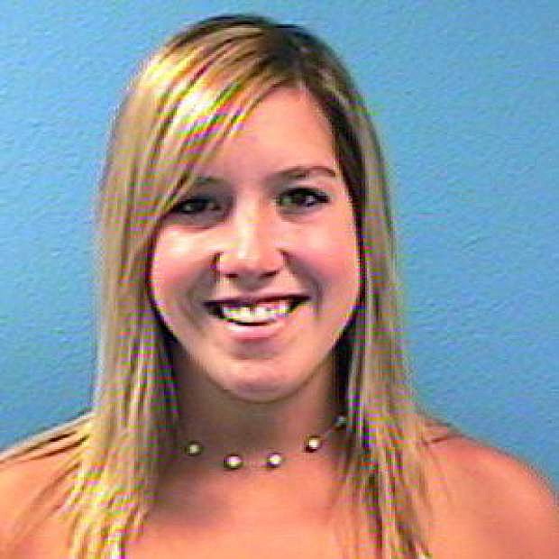 This photo provided by the Scottsdale Police Department shows Allison Feldman.  Court documents indicate that a Feldman, 31,  found killed in her home had a head injury and that police are looking into a particular person. Scottsdale police have said little about the killing of Feldman, found by her boyfriend in her home Feb. 18, 2015.(AP Photo/Scottsdale Police Department)