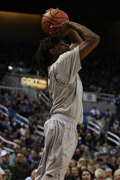 Lindsey Drew takes a jump shot earlier in the season for Nevada.