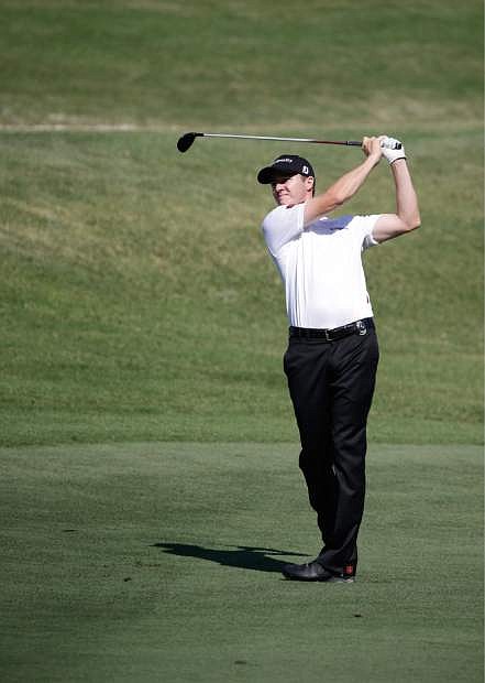 Jimmy Walker watches his shot from the 16th fairway during a practice round for The Players championship golf tournament at TPC Sawgrass in Ponte Vedra Beach, Fla., Wednesday, May 7, 2014. (AP Photo/John Raoux)