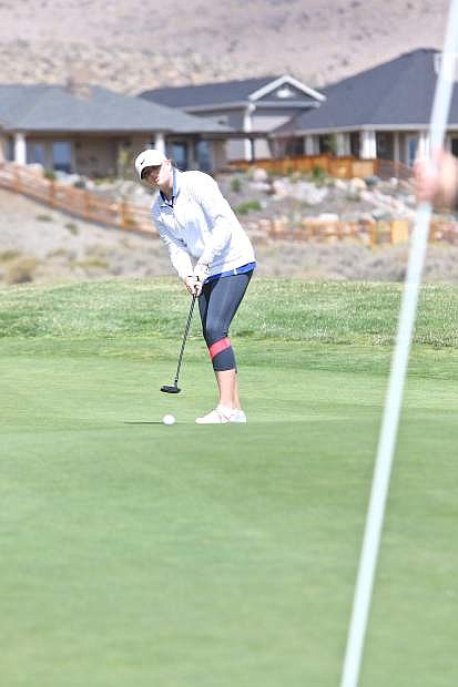 Carson junior Elise McLaren putts on the 4th green at Genoa Lakes Golf Course during Sierra League play Wednesday afternoon.