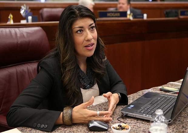 Nevada Assemblywoman Lucy Flores, D-Las Vegas, talks on the Assembly floor at the Legislative Building in Carson City, Nev., on Tuesday, April 23, 2013. The Assembly approved a measure Tuesday that will overhaul the state sex education curriculum. (AP Photo/Cathleen Allison)