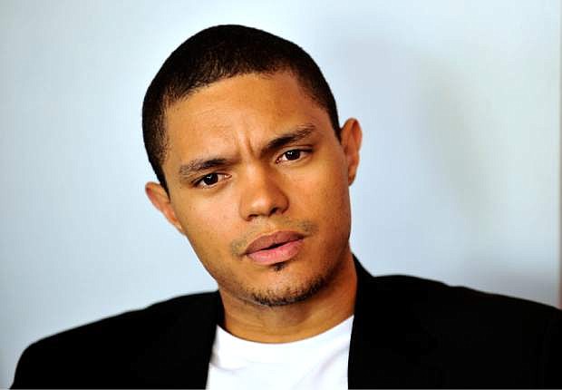 In this photo taken Oct. 27 2009 South African comedian Trevor Noah is photographed during an interview. Trevor Noah, a 31-year-old comedian from South Africa who has contributed to &quot;The Daily Show&quot; a handful of times during the past year, will become Jon Stewart&#039;s replacement as host, Comedy Central announced Monday March 30, 2015. Noah was chosen a little more than a month after Stewart unexpectedly announced he was leaving &quot;The Daily Show&quot; following 16 years as the show&#039;s principal voice. (AP Photo/Bongiwe Mchunu-The Star) SOUTH AFRICA OUT NO SALES NO ARCHIVE