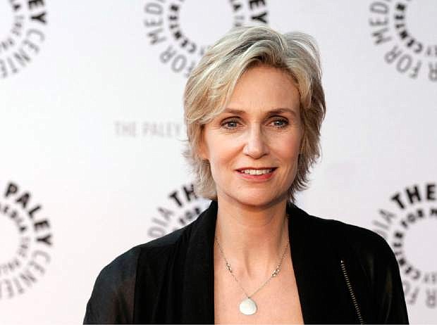 FILE - In this March 13, 2010, file photo, actress Jane Lynch arrives at the &quot;Glee&quot; PaleyFest panel discussion in Beverly Hills, Calif. Lynch will attend the opening ceremony of the Special Olympics USA Games on Sunday. (AP Photo/Dan Steinberg, File)
