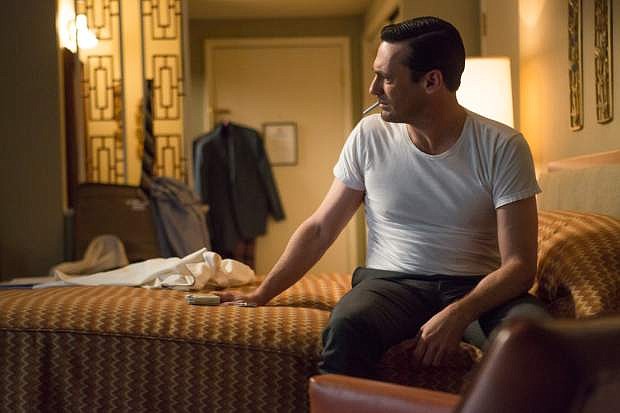 In this image released by AMC, Jon Hamm portrays Don Draper in a scene from &quot;Mad Men,&quot; premiering Sunday at 10 p.m. on AMC. (AP Photo/AMC, Justina Mintz)