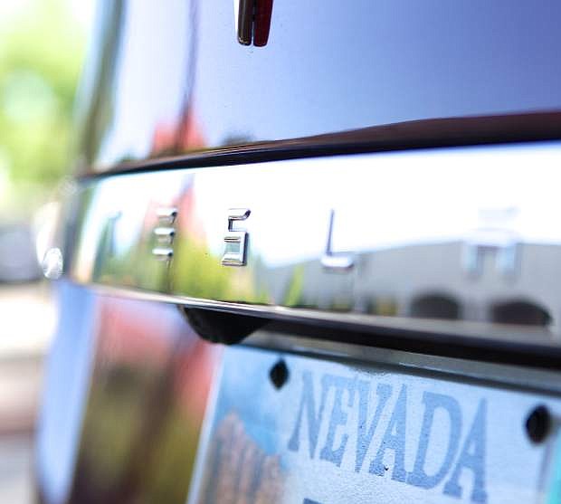 A Tesla Model S is pictured at the Nevada Capitol building in Carson City, not long after the company&#039;s deal with the state of Nevada was struck. The deal expected to bring thousands of jobs and millions of dollars in economic growth to the Reno area, some of which should trickle into the Lake Tahoe Basin.