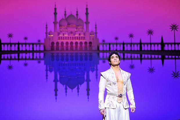 In this Dec. 19, 2013 photo released by Disney Theatrical Productions, Adam Jacobs performs in the musical &quot;Aladdin,&quot; at the Ed Mirvish Theatre in Toronto, Canada. Jacobs will help represent the show Thursday when it appears as an entire category of answers on the quiz game show &quot;Jeopardy!&quot; The game show has long given Broadway a boost since its debut in 1984, offering such categories as &quot;Broadway Musicals&quot; and &quot;Pop Singers on Broadway.&quot; (AP Photo/Disney Theatrical Productions, Deen van Meer)