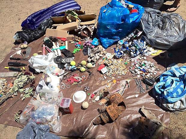 Volunteers picked up plenty of cigarette butts, beer cans and other trash over the Fourth of July weekend in 2014 at Lake Tahoe beaches.