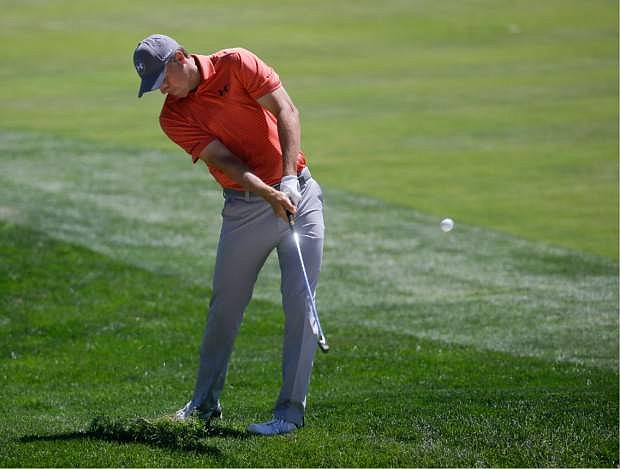 Jordan Spieth hits from rough on the third hole during a practice round for the U.S. Open golf championship at Oakmont Country Club on Tuesday, June 14, 2016, in Oakmont, Pa. (AP Photo/John Minchillo)