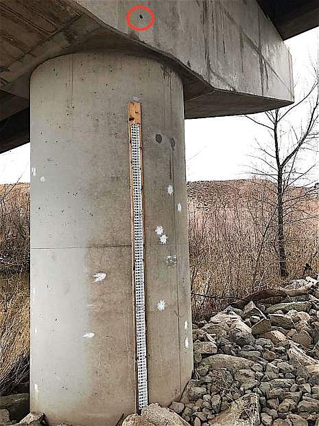 A weather staff is located underneath the bridge off of North Deer Run Road. The marker for the flood of 1997&#039;s is a circle and can be seen above the staff.