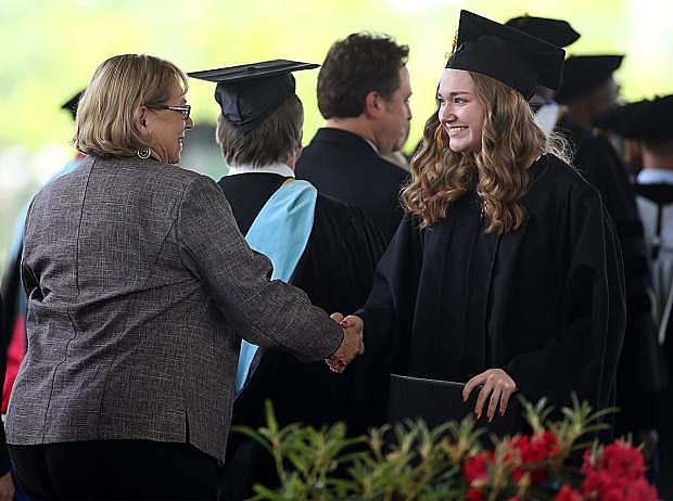 Jump Start graduates receive their diplomas at the 45th annual Western Nevada College Commencement ceremony in Carson City on May 23, 2016. A record 556 graduates received 598 degrees.