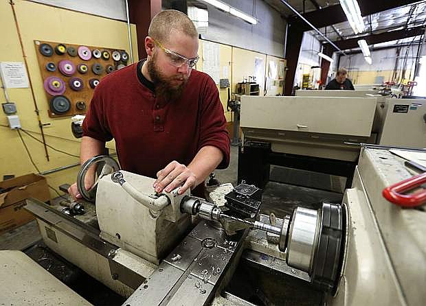 Student Charles Darby works in the Machine Tool Technology lab at Western Nevada College on March 14, 2016.