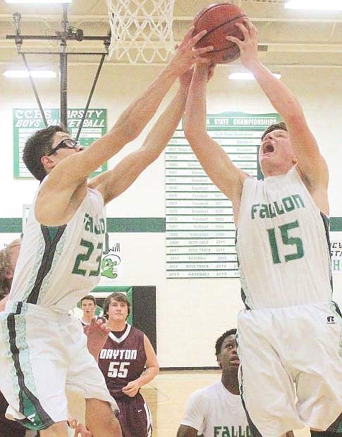 Christian Nemeth and Thomas Steele work together to boost the ball to the basket during Fallon&#039;s game against Dayton.