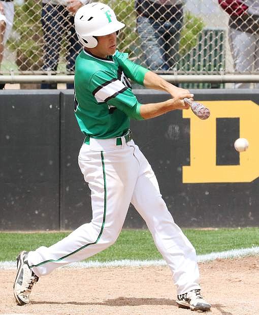 The Wave&#039;s Marshall Coverston connects bat and ball in Fallon&#039;s first game of the state tournament.