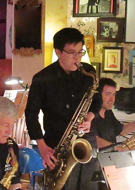 Tenor Sax player Derek Fong with Mile High Jazz Band at Comma Coffee on Oct. 13.