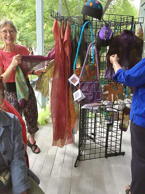 Hand-dyed silk scarves by Claudia Knous will be available at an art sale Tuesday in the lobby of the Carson City Community Center.