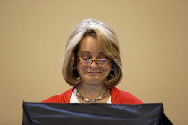Nevada GOP Lieutenant Governor candidate Sue Lowden casts her primary ballot Tuesday, June 10, 2014 in Las Vegas. Lowden faces Mark Hutchison in the primary. Nevada voters also were deciding primary races for state lawmakers, local officials and judges.  (AP Photo/John Locher)