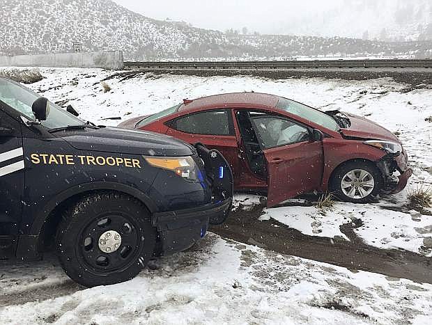 A red Hyundai was forced into a barrier after failing to stop for a Nevada Higway Patrol trooper on Thursday morning in Washoe Valley.