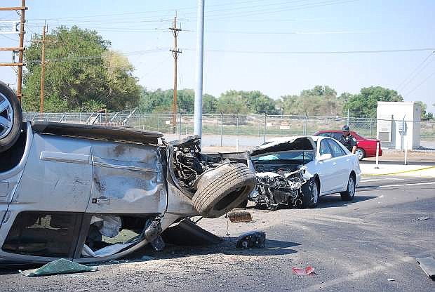 A small four-door car rammed into the side of a Nissan SUV  Wednesday morning at Sheckler Cut-off and the Reno Highway.