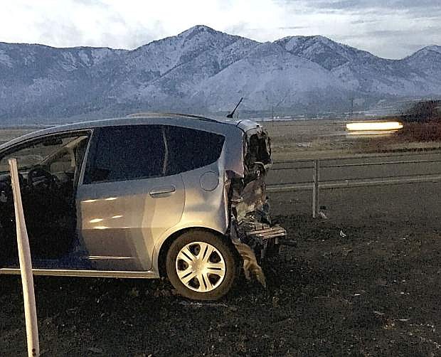 The rear of a Honda Fit was crushed in a Tuesday afternoon collision at Johnson Lane and Highway 395 that claimed the life of a toddler.