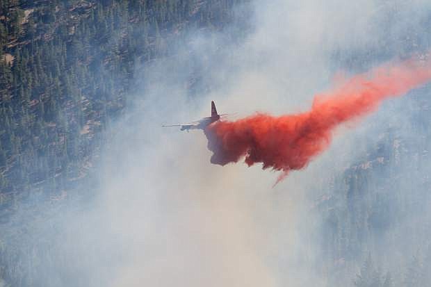 An NDF aircraft lays down retardant on the Kingsbury fire in August 2014. More than $300,000 is available to reduce hazardous fuels on 100 acres of land around Kingsbury Grade.