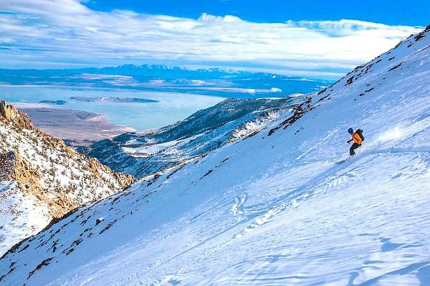 Skiing off the south peak out of Virginia Lakes gives this skier a breath taking view.