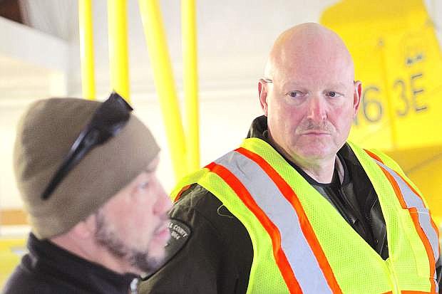 Retired CCSO Capt. Mike Matheson, right, taks with Navy training officer Chris Pierce during an active-shooter drill in Februay 2016.