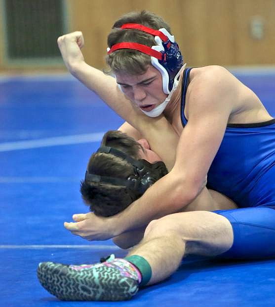 Carson&#039;s Dawson Breuer on his way to defeating Spanish Springs&#039; Ethan Hansen in a 160 lb. bout Saturday morning at CHS.