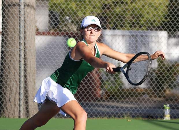 Fallon senior Melanie Nuckolls reaches for the ball in the Lady Wave&#039;s regional championship against Truckee in October. She won the regional singles title.