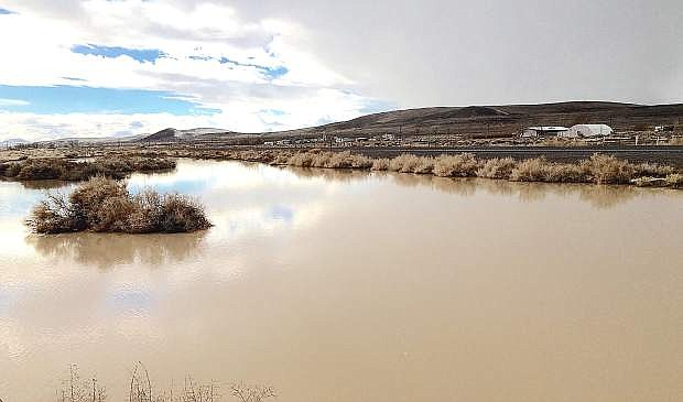 Most locations in western Nevada have experienced a wet January with rain and snow. Snow has buried the Sierra range, while beds of water including an area between Leeteville Junction and Lahontan Reservoir now dot the desert landscape. The weatherman is calling for sunny skies on Wednesday with a chance of rain or snow on Thursday. Friday will revert back to mostly sunny skies. Highs will be in the 30s, and morning lows will be between 15-20 degrees.