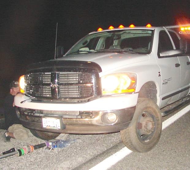 A Fallon man and his passenger were not injured Friday night when their pickup ran over three tire rims on the Lovelock Highway.
