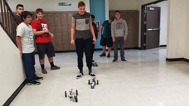 Carson High School CTE engineering students with robots assembled in class in 2016.