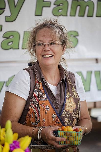 Loni Holley of Holley Family Farms at Carson City&#039;s 3rd and Curry St. Farmers Market.