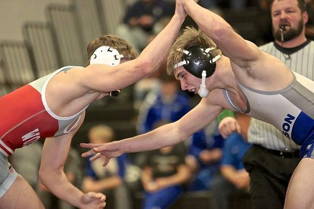 Carson&#039;s Jarod Butler battles Wooster&#039;s Christian Hanley in a 160-pound match this season at Douglas High.