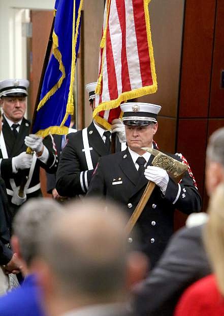 The Reno Firefighter Association&#039;s Honor Guard presents the Colors in the Assembly Chamber on Monday.
