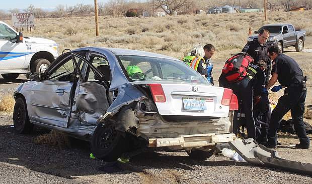 A two-car crash Wednesday at Bango Road and U.S. Highway 50 injured a Fallon man.