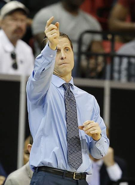 Nevada coach Eric Musselman gestures to his team during the second half against Colorado State in an NCAA college basketball game for the Mountain West Conference tournament championship Saturday, March 11, 2017, in Las Vegas. Nevada won 79-71. (AP Photo/Isaac Brekken)