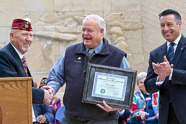 Marine Corps veteran John Louritt is recognized as Veteran of the Month Wednesday during the 2017 Veterans and Military Day at the Legislature.